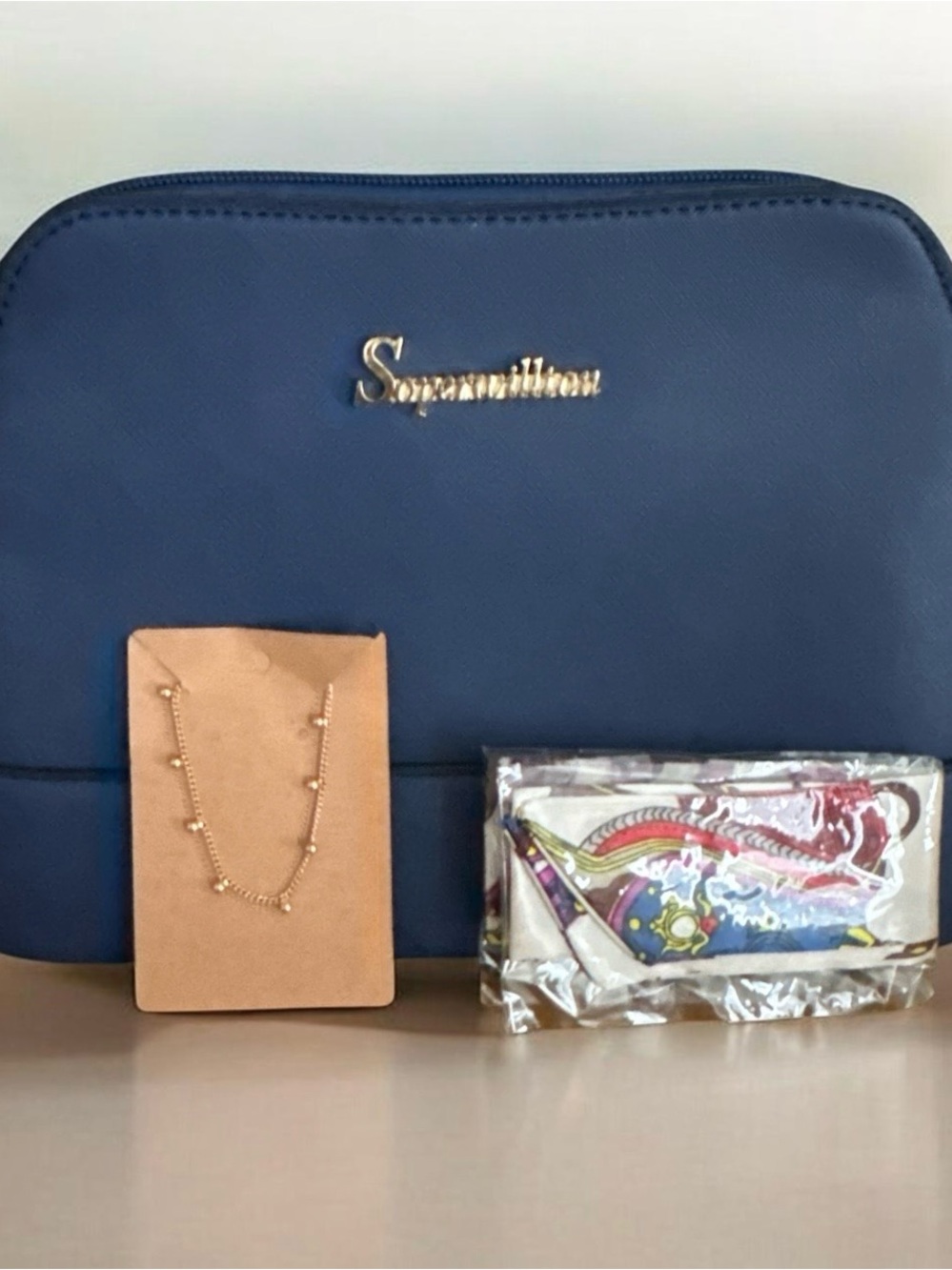 Willow Navy Cosmetic Bag with Gold Logo